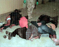 Prisoners bound and tormented