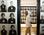 Pictures of victims adorn theformer Tuol Sleng torture centre