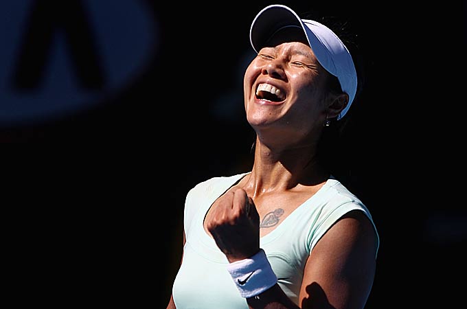 Na Li of China celebrates match point after winning her semifinal match against Caroline Wozniacki of Denmark during day eleven of the 2011 Australian Open at Melbourne Park on January 27, 2011 in Melbourne, Australia