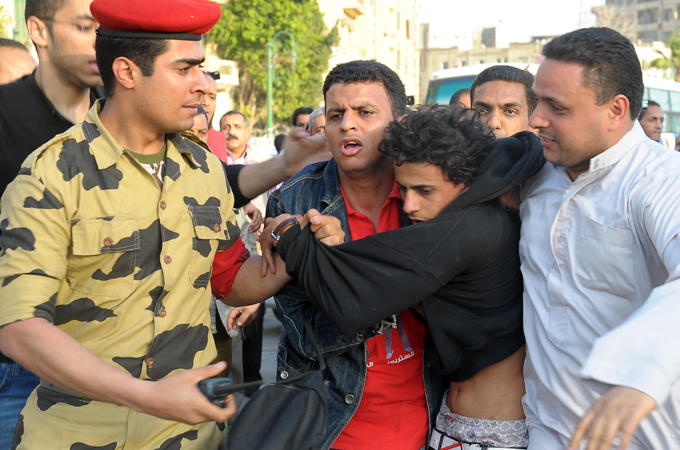 Egyptian arrested by military in Tahrir square - goes with Kieron Monks article