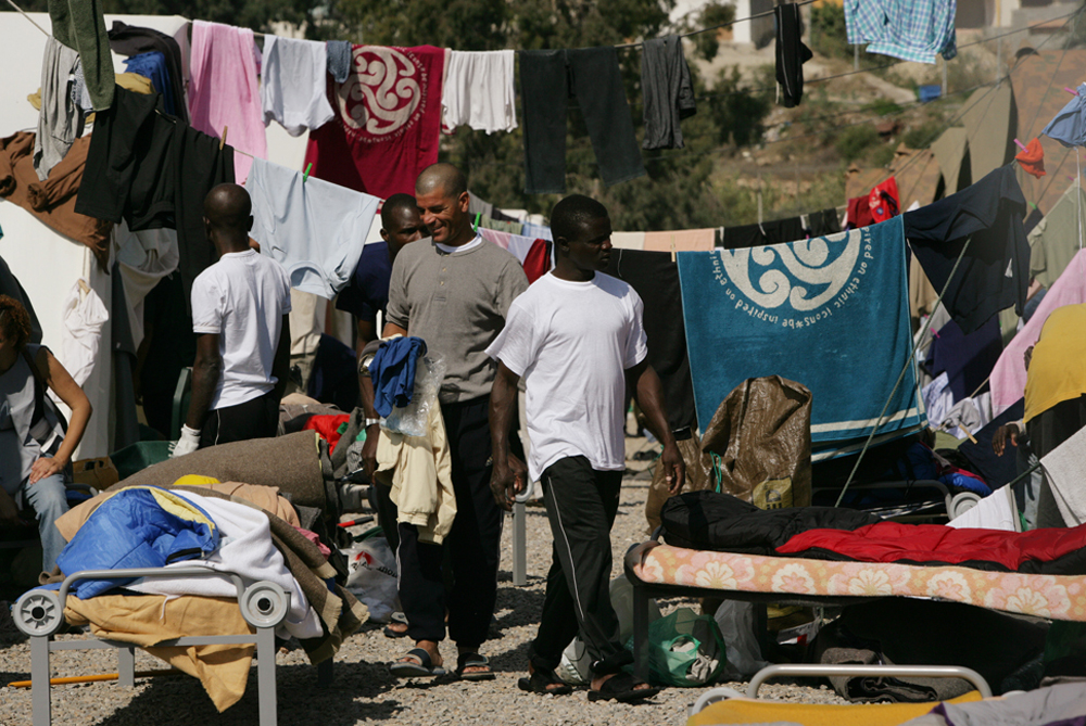 African migrants are seen outside at the CETI, Short Stay Immigrant Center