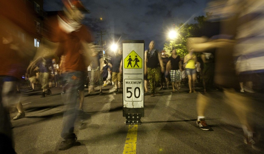 Protesters march during a demonstration against a new emergency law in Montreal
