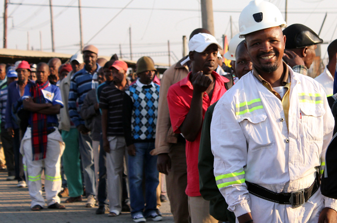 Striking SA miners return to work