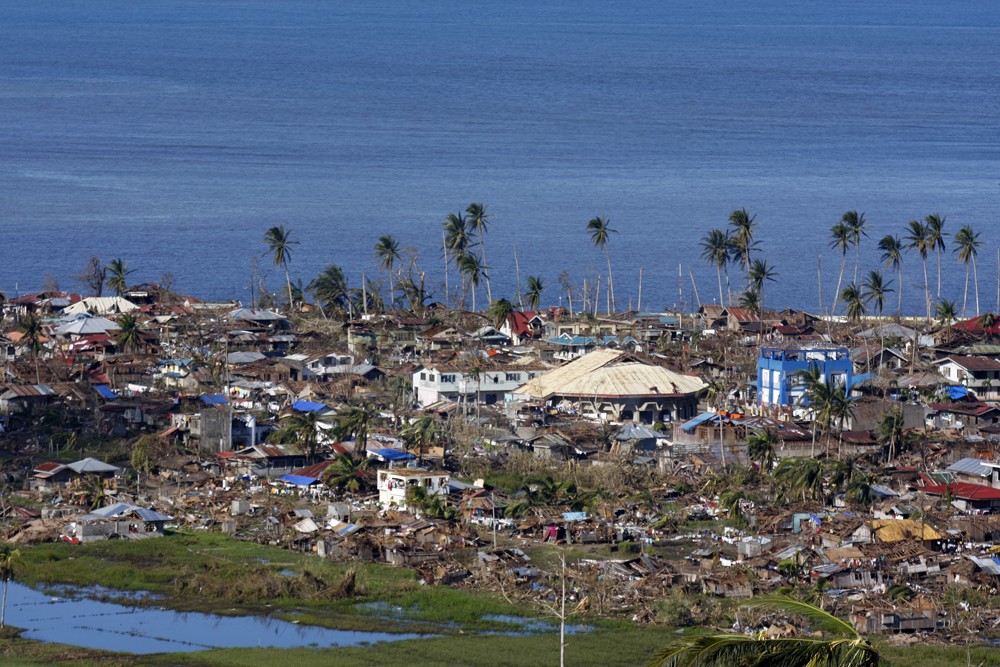 The town of Boston, in the southern Philippines(***) Compostela Valley province, was devastated by Typhoon Bopha.