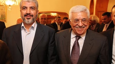 Palestinian President Mahmoud Abbas, right, with Hamas leader Khaled Meshaal arriving before their meeting in Egypt, November 2011. [EPA]