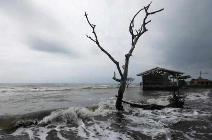 A view of a street flooded with sea water at Mayangan village in Subang, Indonesia''s West Java province