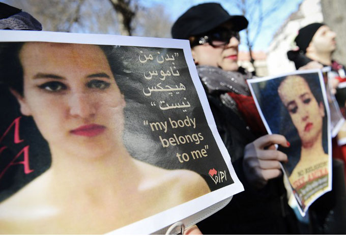 "Whilst Femen may be more extreme than most, their idea that western feminists will free Muslim women is a sentiment widely shared. It infantilises Muslim women," writes author [AFP]