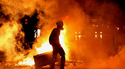 A gas-masked man during Istanbul's Gezi Park protests near Taksim Square in June 2013 [EPA]
