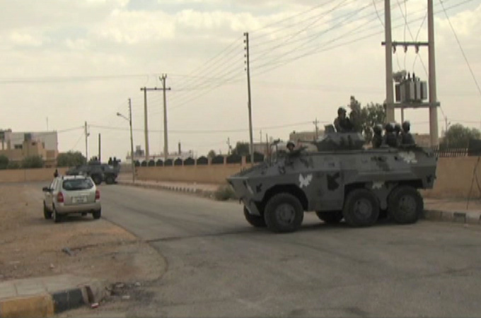 Protesters and security forces clash in the impoverished Jordanian city of Maan for fifth day over deaths of two people.