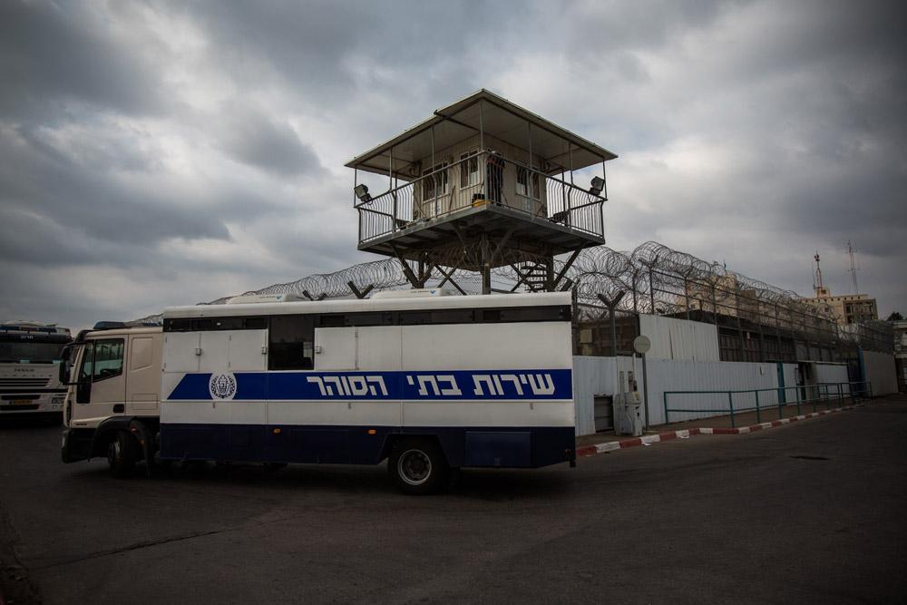 <p>A police truck drives out of of Ayalon prison on August 13, 2013 in the city of Ramla, hours before Israel released 26 Palestinian prisoners.</p>