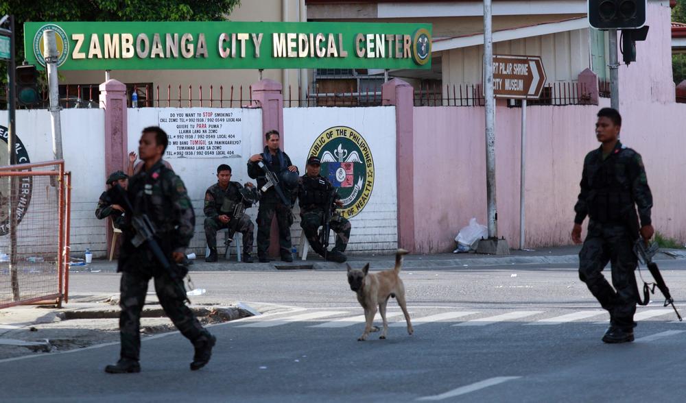 Soldiers patrol the main streets of the southern Philippine city of  Zamboanga. 