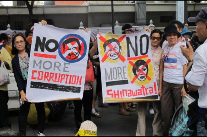 The government of PM Yingluck Shinawatra "has destroyed the 'true democratic value' the Thais hold dear", writes former FM Piromya [Rob Kennedy/Al Jazeera] 