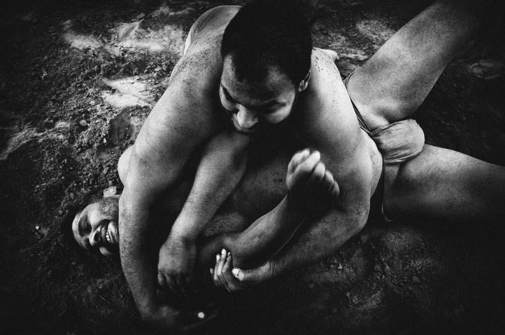 <p>Jawala Tiwari, one of the known names in Kushti, spars with his student in his akhara (wrestling school) in the eastern city of Kolkata.</p>
