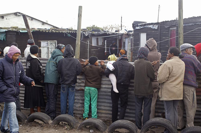 Local Cape Town anti-violence programmes are using former gang members to mitigate violence between rival criminal factions [AP]