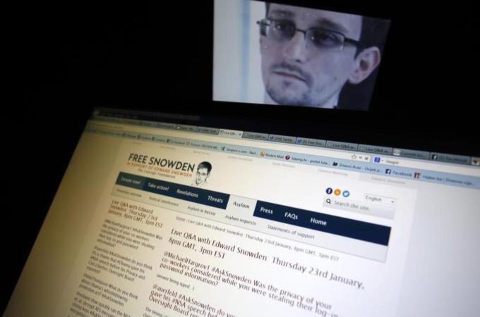 The exiled computer expert condemned "indiscriminate mass surveillance" [Reuters]