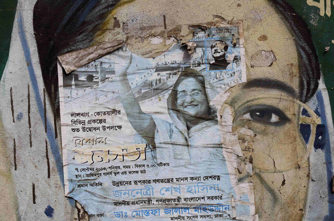 The Awami League should bring back the caretaker government to oversee the elections [Reuters]