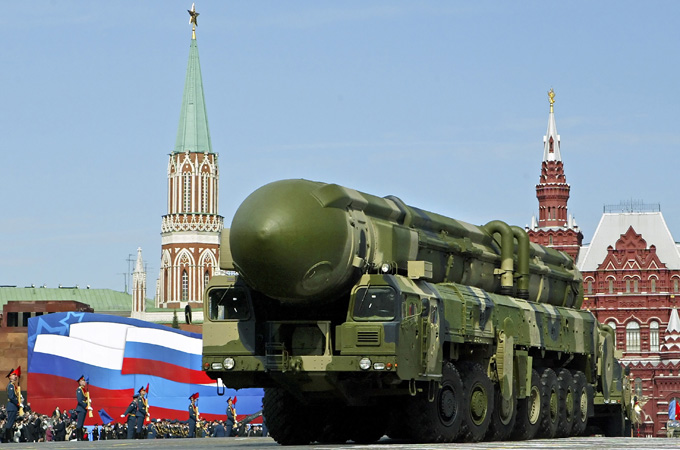 A Russian truck-mounted Topol intercontinental ballistic missiles rolls through Red Square in 2008 [AP]