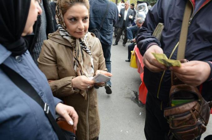 Iran's currency is down 80 percent in two years, and poverty is growing [Getty Images]