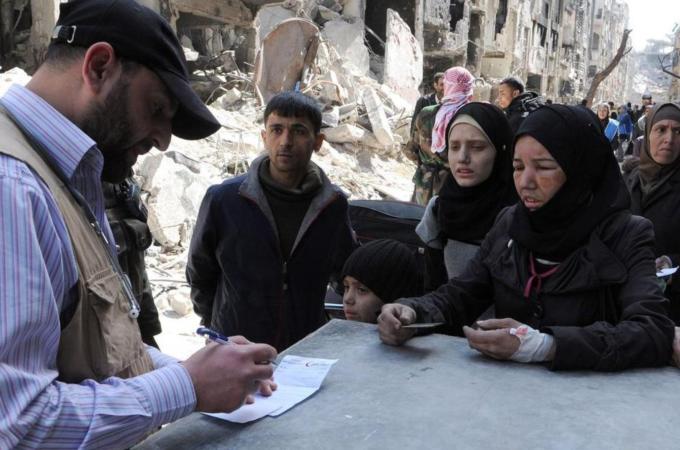 Yarmouk is the latest reminder of the international community' failure to address the plight of Palestinian refugees, writes Munayyer [EPA]