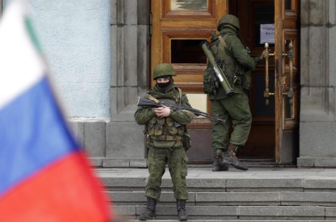 Armed men took control of Simferopol's political offices, airport and warm-water Black Sea port on March 1 [EPA]