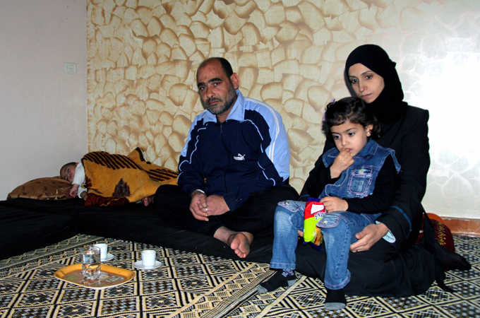 Refugee Alaa Barakat and his family entered Gaza through tunnels from Egypt [Khaled al-Ashkar/Al Jazeera]