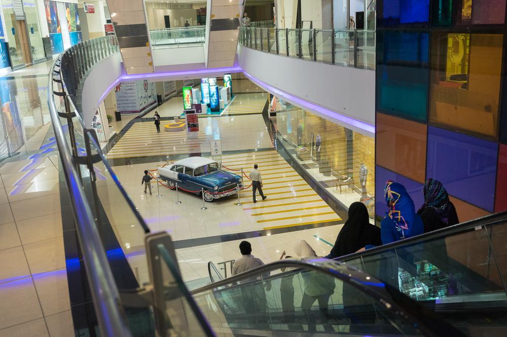 <p>People shopping at the Isfahan City Centre Mall, one of the biggest in the country.</p>