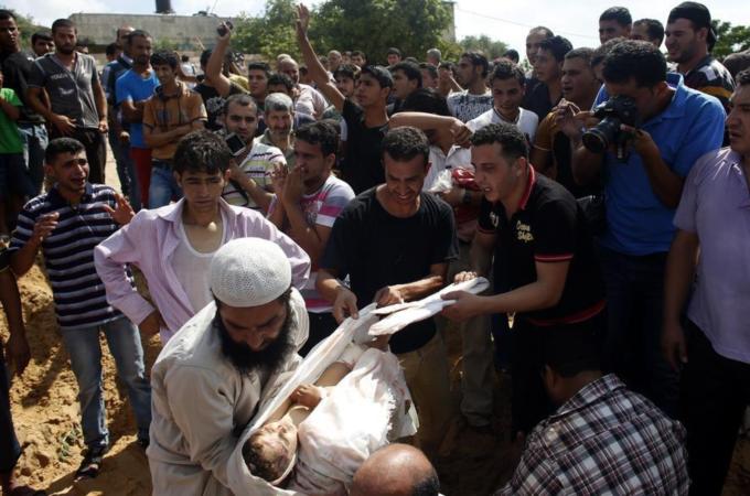 The Israeli offensive on Gaza has killed more than 200 Palestinian children [AFP]