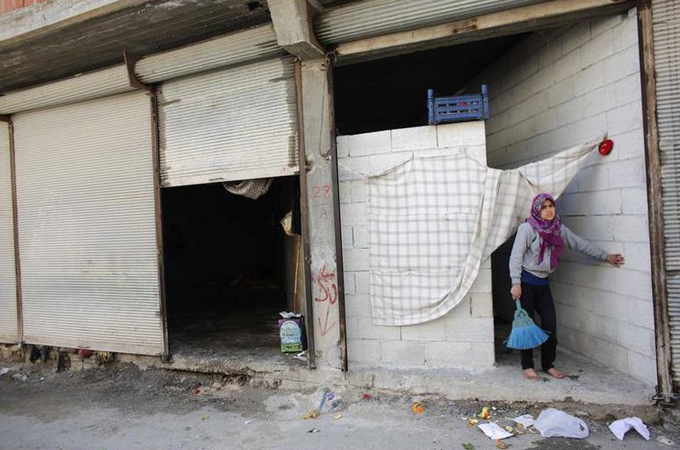 Health centres have been set up in abandoned buildings in southern Turkey to treat Syrian refugees [Reuters]