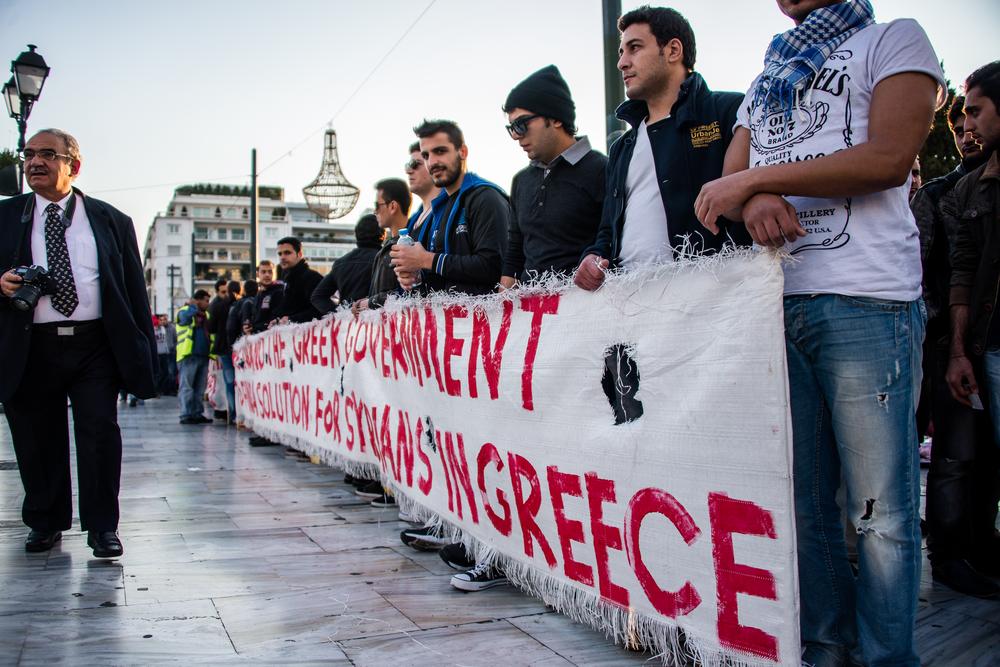 <p>Protesters at Syntagma square demand the Greek government find a solution for Syrian refugees. </p>
