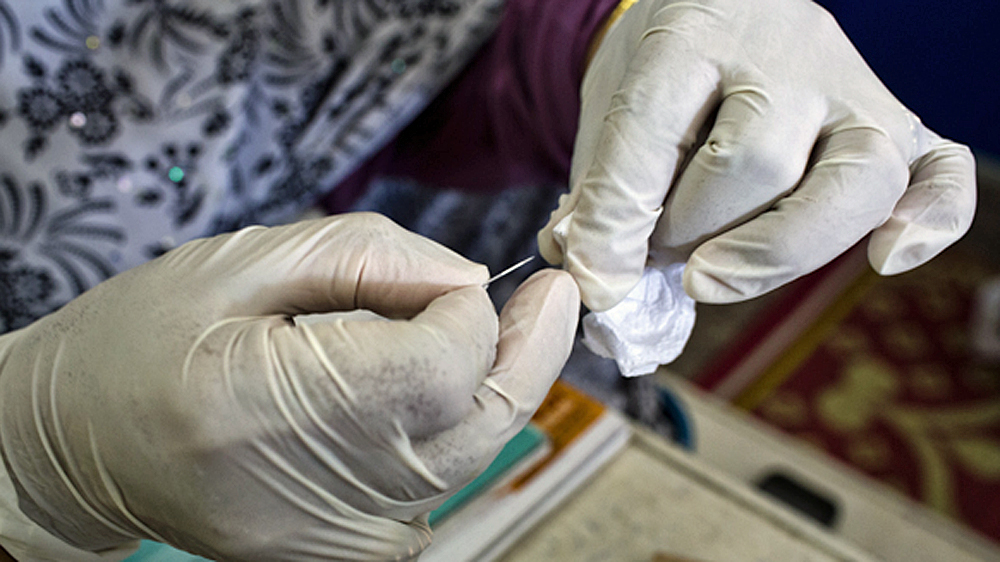 Dr Umasa believes that the procedure, if done by a doctor, should not be considered mutilation. [Lillian Suwanrumpha]