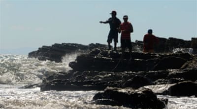 Fishermen cast their lines into the mouth of the Brito River, the future start point for Nicaragua's planned transoceanic canal [Lindsay Fendt/Al Jazeera]