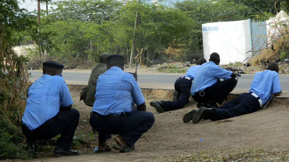 Security forces surrounded the campus after gunmen opened fire indiscriminately in campus hostels [AP]