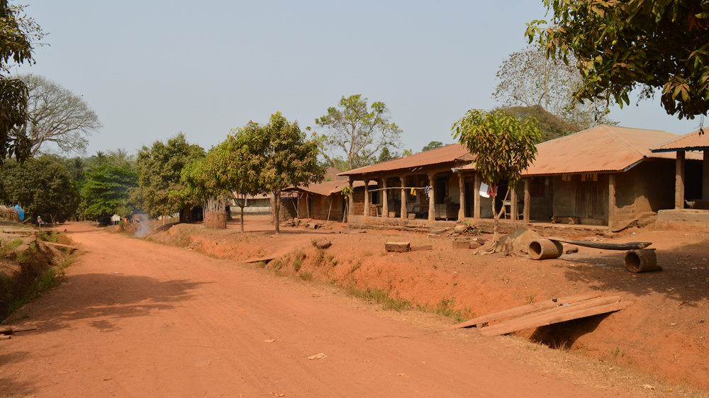 The main road into Kagbantama [Dariusz Dziewanski/Al Jazeera]