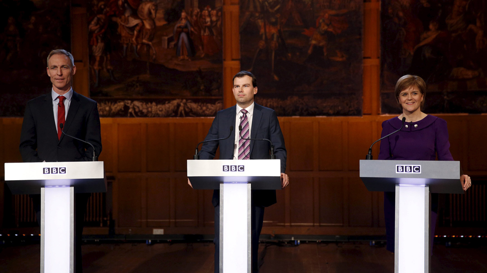 Jim Murphy (Scottish Labour), BBC''s James Cook, and Nicola Sturgeon (SNP) pose for a photograph before taking part in the BBC Scotland leaders'' debate in Aberdeen