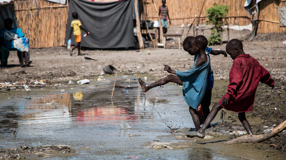 Bentiu is a warren of narrow, dirt walkways, cramped huts and open sewage channels [Ashley Hamer/Al Jazeera]