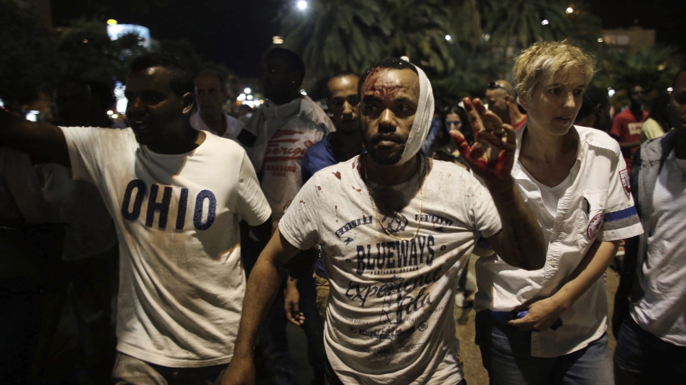 A wounded Israeli of Ethiopian origin during a protest against racism in Tel Aviv [EPA]