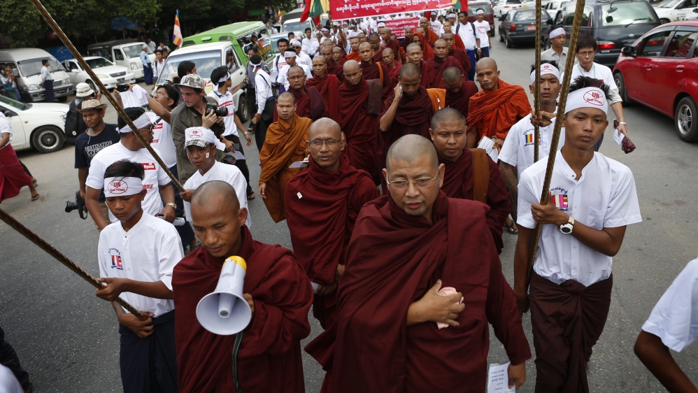 Hardliners protest the role of Myanmar in boat migrant crisis