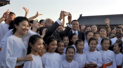 Modi takes a selfie along with Chinese Premier Li Keqiang in Beijing [Reuters]