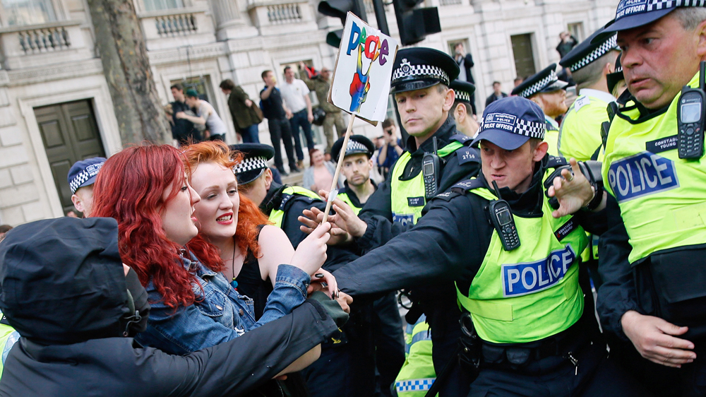 Protesters denounced the re-election of the cost-cutting Conservative Party [Reuters]