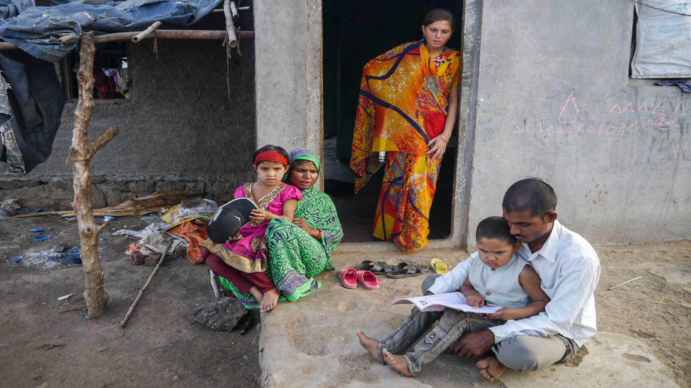 The family of Dilip Ikaram Thackery, who killed himself [Baba Umar/Al Jazeera]