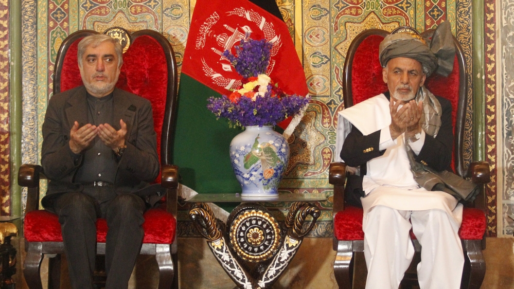 Ashraf Ghani and Abdullah Abdullah [Reuters]