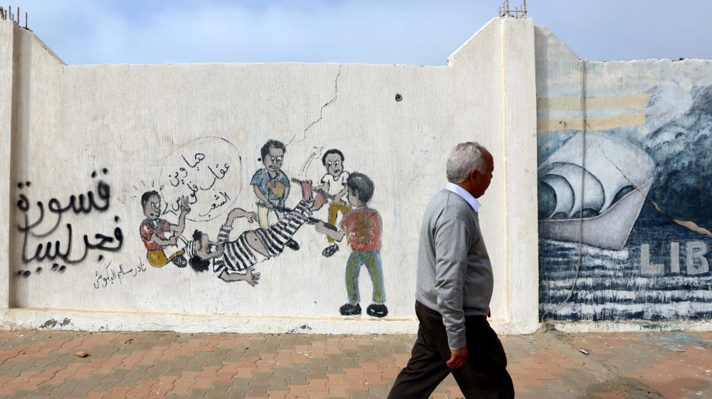 Four years after the overthrow of Gaddafi, Libya's cities remain carved up by rival factions and governments [Getty Images]