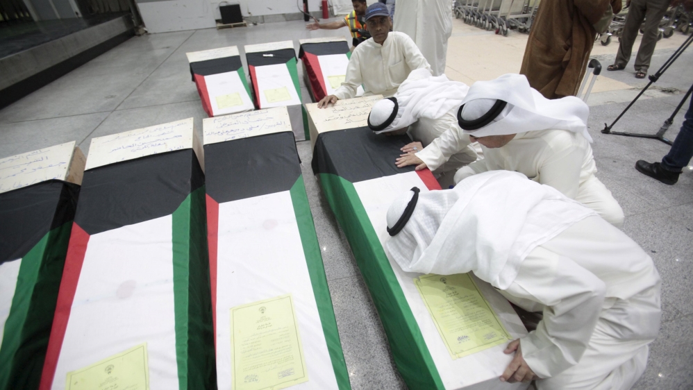 Thousands of Sunnis and Shia Muslims from across the country took part in the victims' funeral procession [Reuters]