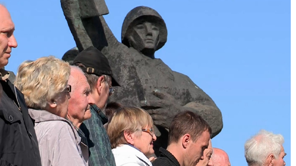 Ethnic Russians attend a rally in the Latvian capital Riga on May 9, 2015. The day commemorates the defeat of Nazi Germany during World War II, and is one of the most important days in the Russian calender [Al Jazeera]