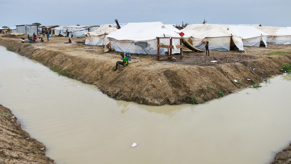 
In early June, camp officials began relocating the majority of UNMISS camp residents to other sections with proper water drainage [Samer Muscati/HRW] [-]
