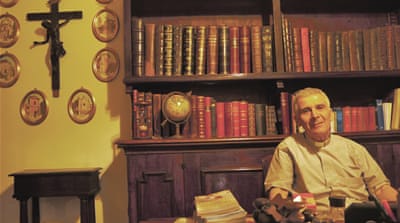 Don Stefano Ottane, Catholic priest [Sean O'Neill/Al Jazeera] 