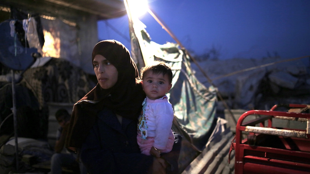 Many families in Gaza have been living in the ruins of their homes  [EPA]