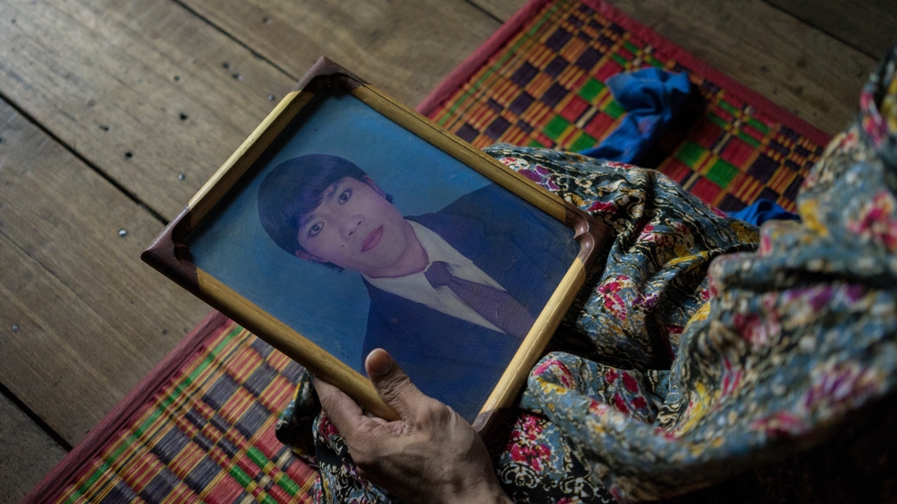 Srey Champa holds an old photo of her taken for an ID card. Aside from the general provisions in its constitution, Cambodia has no laws specifically protecting members of the LGBT community against discrimination or violence. The authorities also seem to have gone back on their promises to include lesbians and transgender women within the ambit of an action plan to stop gender-based violence [Thomas Cristofoletti/Ruom]