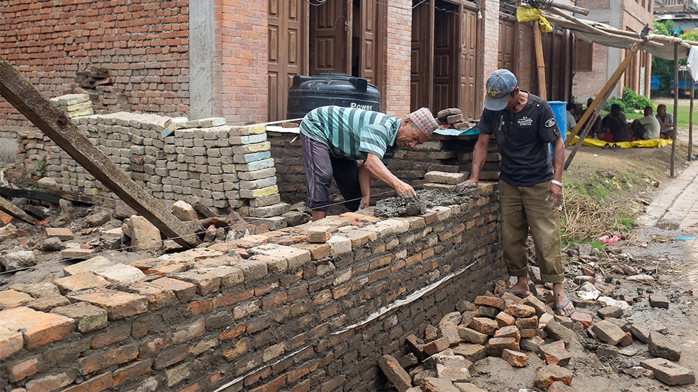 Without proper reconstruction guidelines, experts worry people could just end up rebuilding dangerous homes [Juliette Rousselot/Al Jazeera]