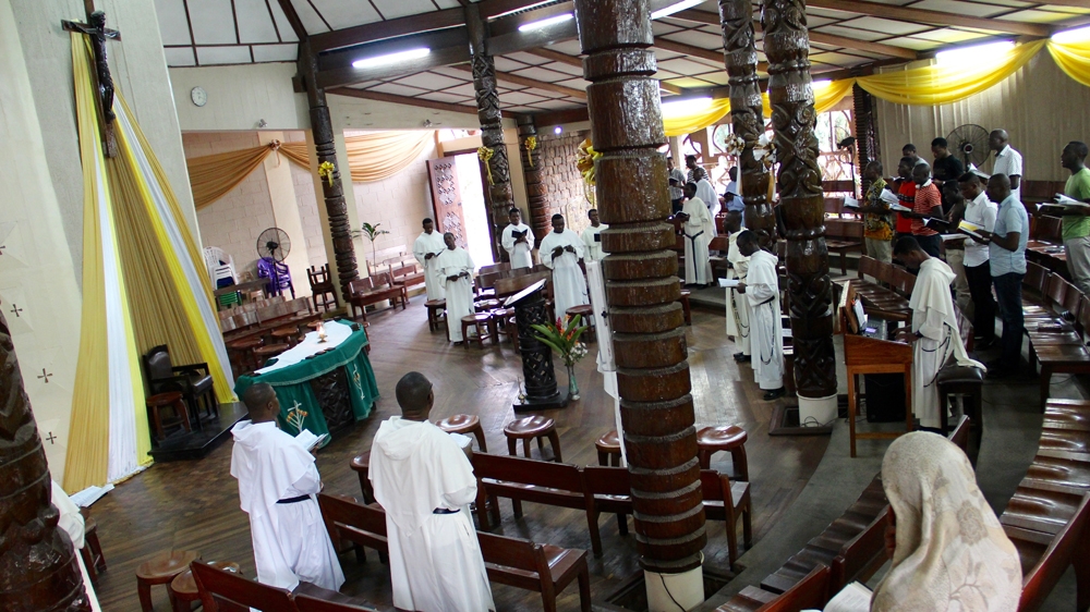 The brothers sing their evening prayers [Femke van Zeijl/Al Jazeera]